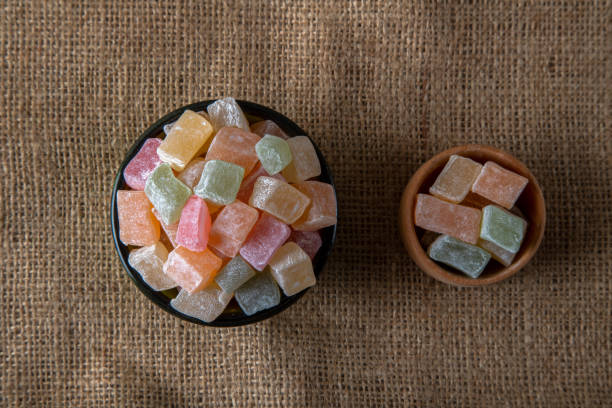 istock Traditional Turkish delight in a bowl on a burlap background 1393121956
