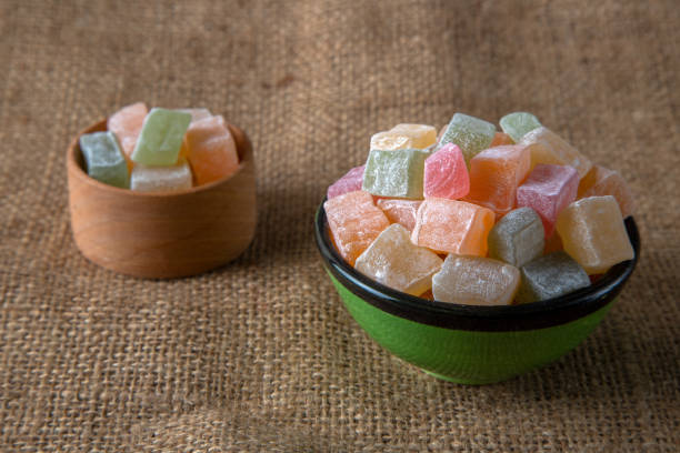 istock Traditional Turkish delight in a bowl on a burlap background 1393122019