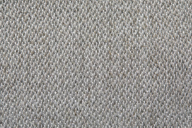 istock Knitted texture. Texture of jacquard fabric with gray geometric pattern. Crochet mosaic pattern 1393123264