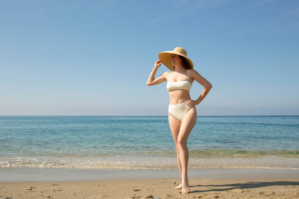 istock Young woman on the beach 1393126130