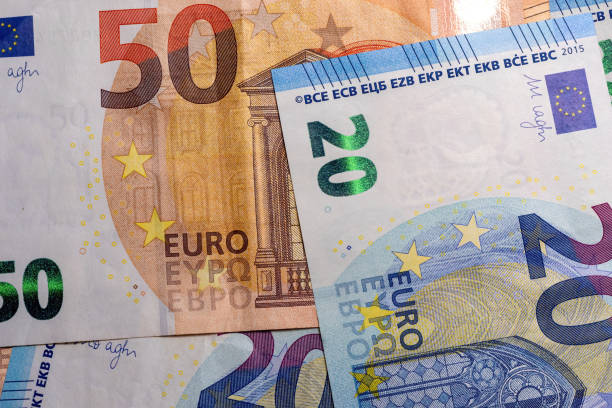 istock Euro banknotes 20 and 50 euro background 1393127974