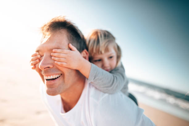istock happy father embracing the dauhgter 1393135991