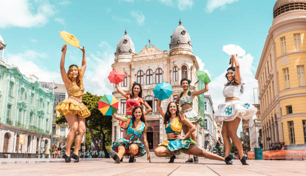 Frevo dancers at the street carnival in Recife, Pernambuco, Brazil. Frevo dancers at the street carnival in Recife, Pernambuco, Brazil. 21 24 months stock pictures, royalty-free photos & images