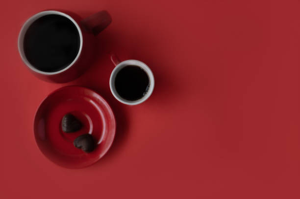 istock Red coffee mugs with two heart chocolate 1393141568