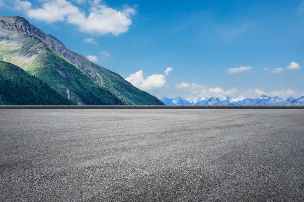 istock Asphalt road and mountain nature landscape 1393142499