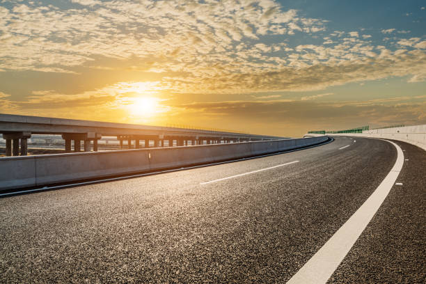 istock Asphalt road and sky cloud landscape at sunset 1393142762