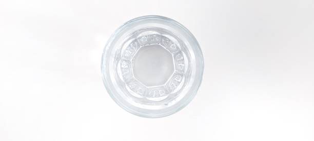 istock Glass of water in white background 1393143550