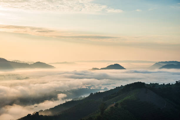 istock Sunrise and the mist in winter morning 1393148418