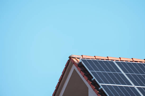 istock Solar panels on a house roof 1393152288