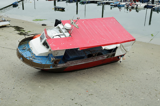 Boats lying on the bottom at low tide