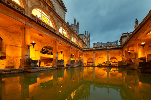 Restored ancient Roman Baths in the evening. stock photo