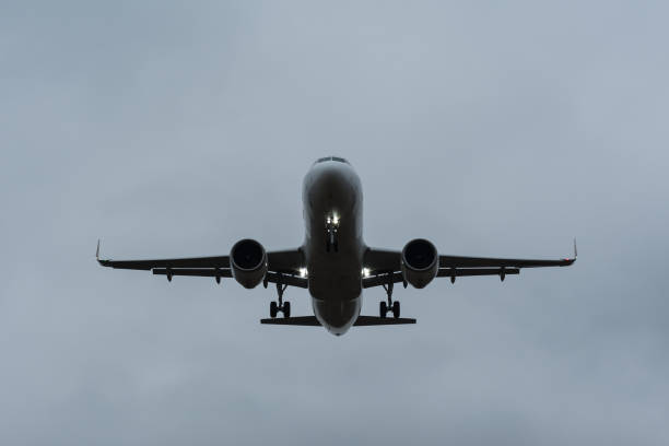 istock landing aircraft during windstorm 1393155736