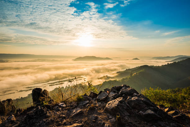 Sunrise and the mist in winter morning Aerial view, landscape of mountain and the mist with sunrise in winter, view from top of mountain nong khai province stock pictures, royalty-free photos & images
