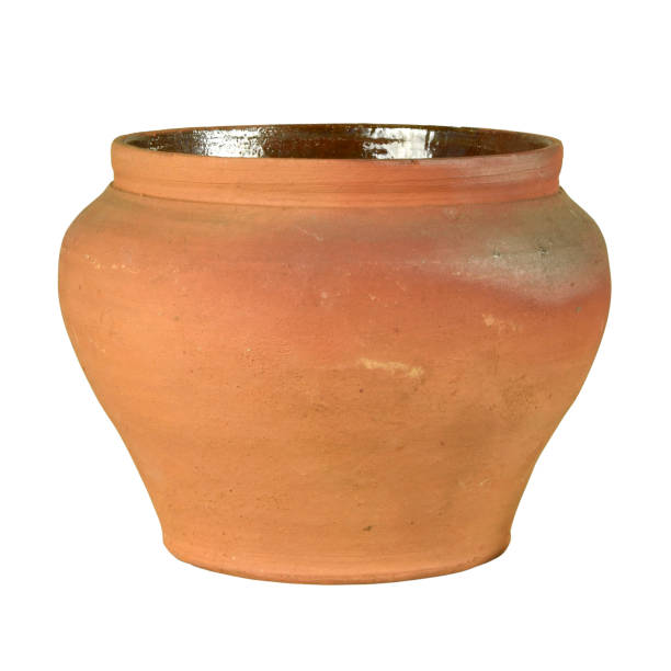 istock Old red clay pot isolated on white 1393159140