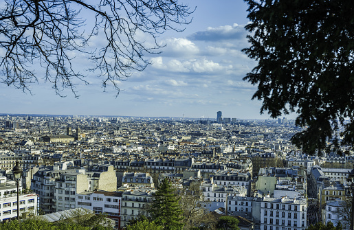 Paris city view from butte Montmartre summit during the day
