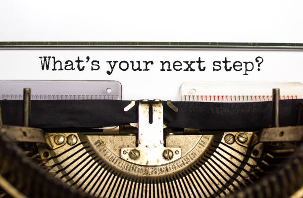 istock What is your next step symbol. Concept words What is your next step typed on retro typewriter. Beautiful white background. What is your next step business concept. Copy space. 1393161925