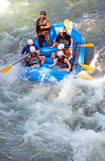 White water rafting through Class 3 rapids on Pacuare River, Limon, Costa Rica. Costa Rica is the central American country north of Panama that is renowned for its tropical birdlife, exotic wildlife and adventure pursuits such as whitewater rafting, parasailing and ziplining