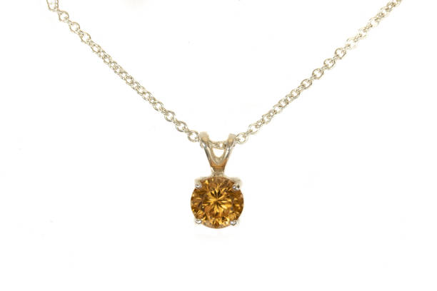 istock Gold Zircon pendant, silver chain. White background. 1393164446