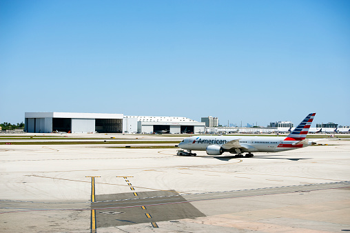 American Airlines Boeing 777 being towed at Miami Airport, Florida, U.S.A. Miami International Airport, MIA, previously Wilcox Field, is the main airport in Florida serving the United States and international destinations, including Latin America.