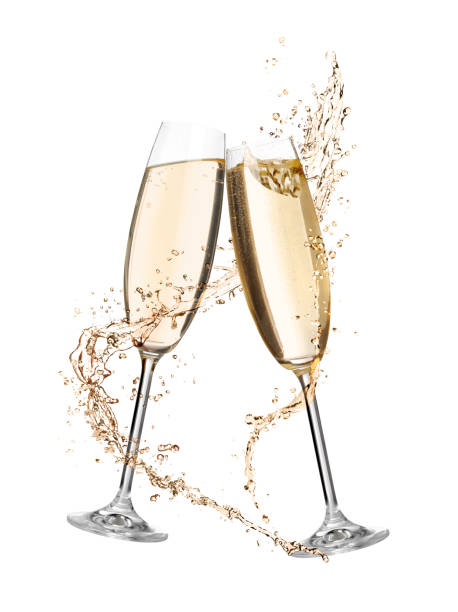 istock Glasses with sparkling wine and splashes on white background 1393164792