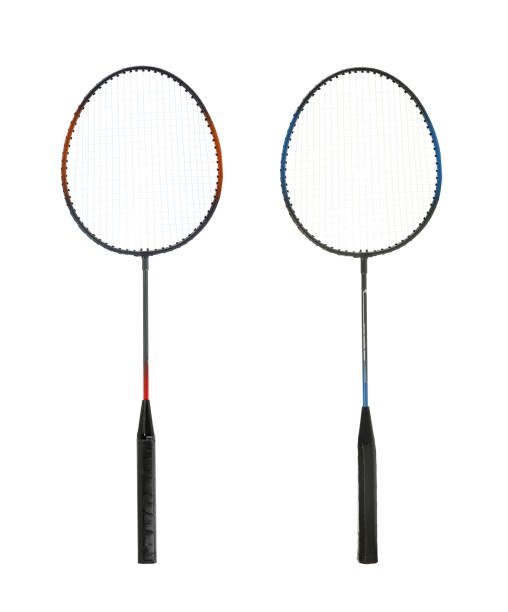 istock Two badminton rackets on white background. Sports equipment 1393164796