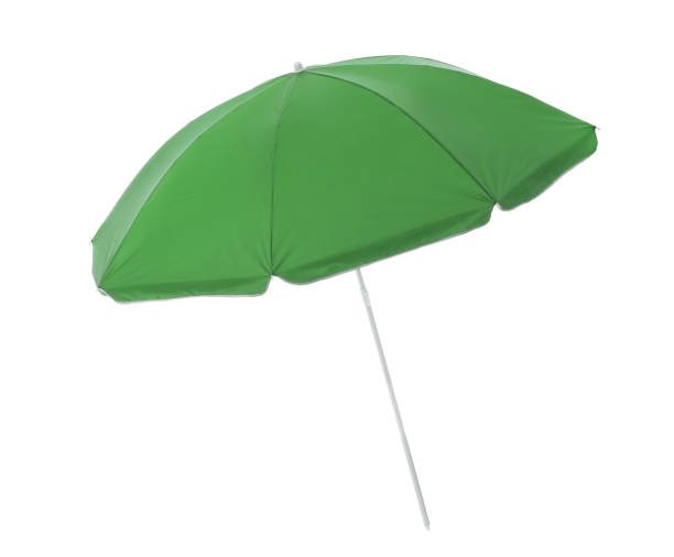 istock Open green beach umbrella isolated on white 1393165710