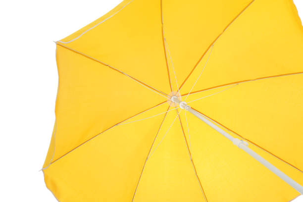 istock Open yellow beach umbrella isolated on white. Inner side 1393165885