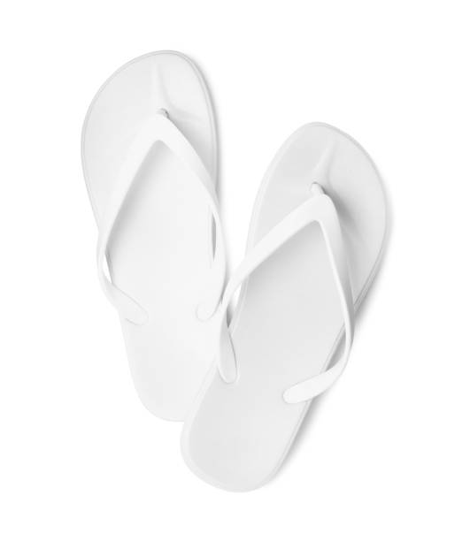istock Pair of stylish flip flops isolated on white, top view 1393166932