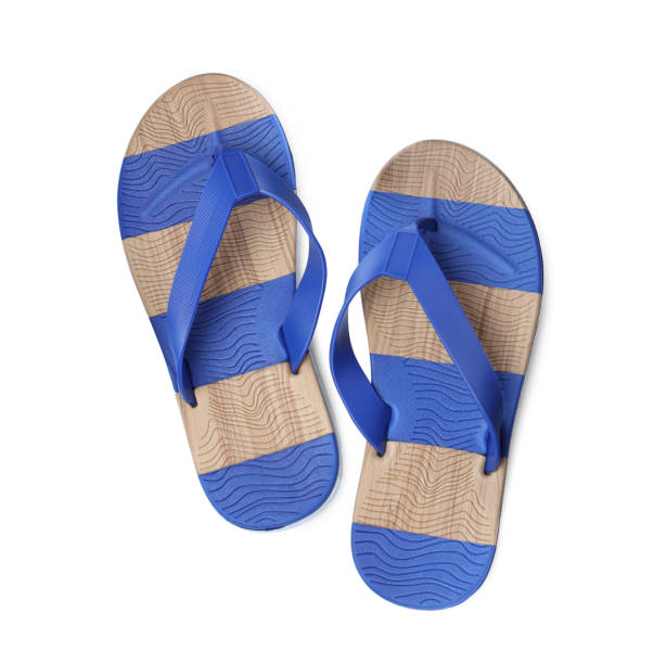 istock Pair of bright flip flops isolated on white, top view 1393166960