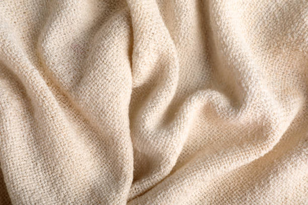 istock Beige hemp cloth as background, top view. Natural fabric 1393168743