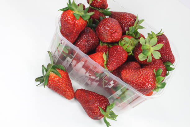 istock freshly picked large red strawberries in trays- 1393170845