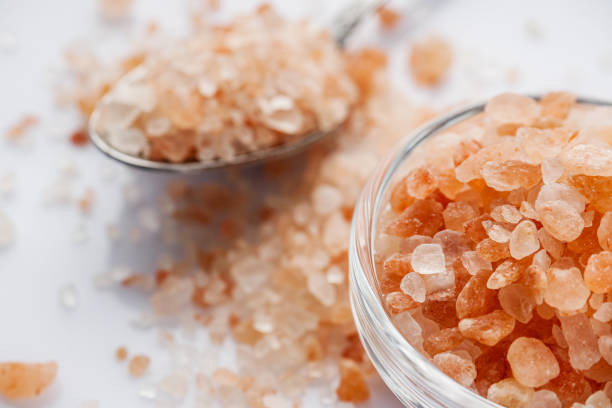 istock pink Himalayan salt on a white background 1393172648