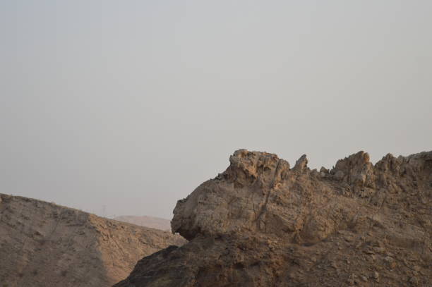 istock Mountains in the desert and the sky 1393172703