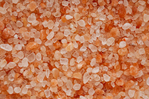 istock pink Himalayan salt on a white background 1393173567