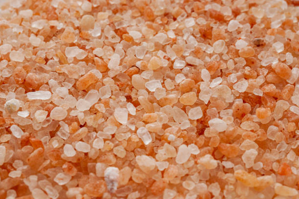 istock pink Himalayan salt on a white background 1393173624