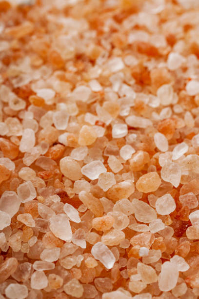 istock pink Himalayan salt on a white background 1393173744