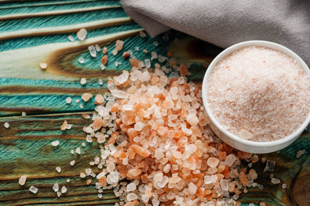 istock pink Himalayan salt on a wooden rustic background 1393174850