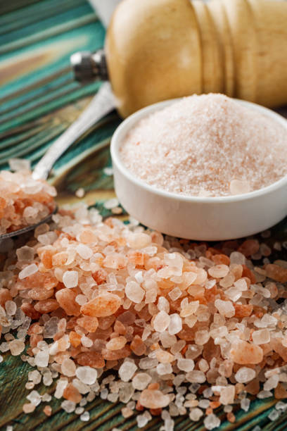 istock pink Himalayan salt on a wooden rustic background 1393176124