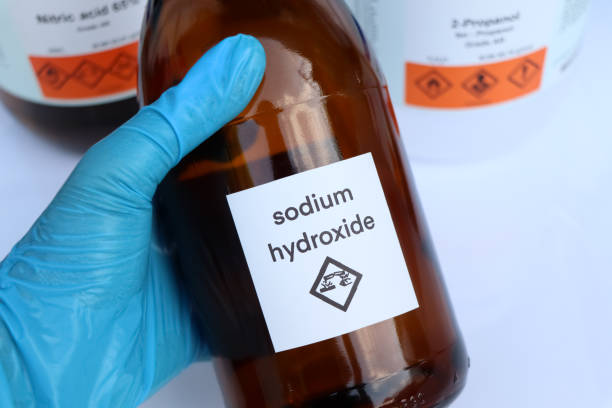 Sodium hydroxide in bottle, chemical in the laboratory Sodium hydroxide in bottle, chemical in the laboratory and industry hydroxide stock pictures, royalty-free photos & images