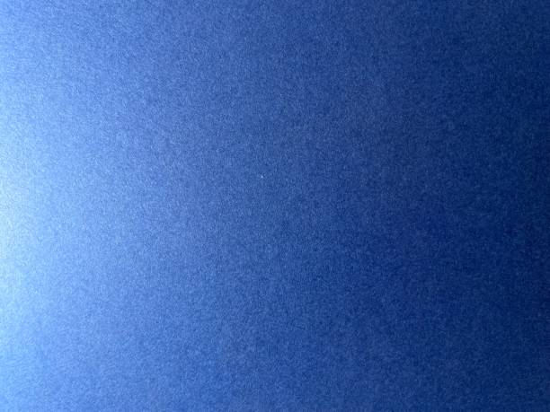 istock Close up of blue textured paper background 1393177378