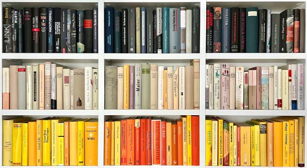 istock Black, beige and yellow book rows 1393189115