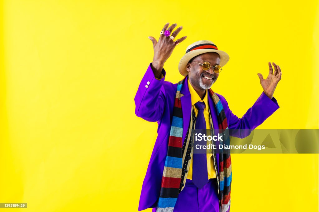 Cool senior man with fashionable outfit portrait Cool senior man with fashionable clothing style portrait on colored background - Funny old male pensioner with eccentric style having fun Senior Adult Stock Photo