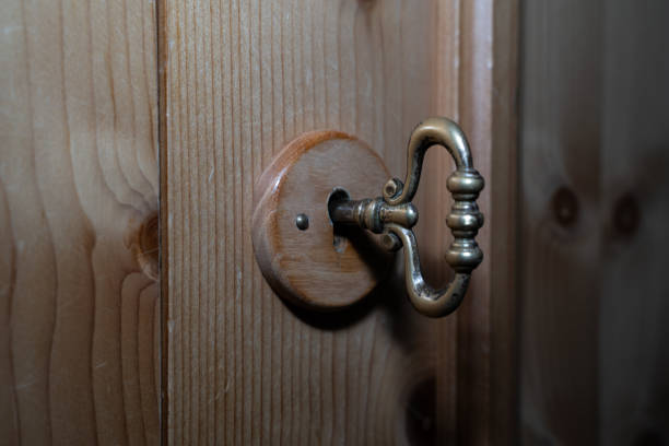 House key on the wooden table background
