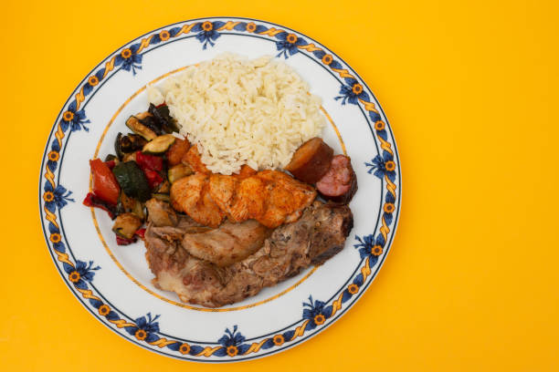 istock grilled meat with vegetables and rice on the plate 1393197901