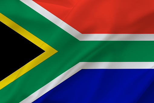 South African flag on skyscraper building background. Pretoria, Capetown. 3d illustration