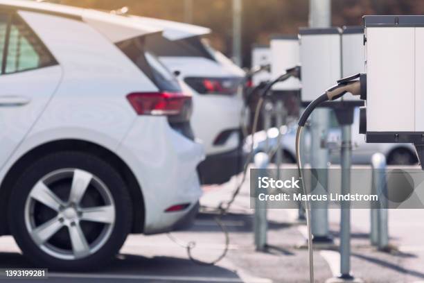 Charging Stations For Electric Cars At A Parking Lot Stock Photo - Download Image Now