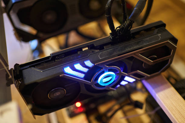 istock close-up video card attached to a crypto farm for mining. several video cards work, mine cryptocurrency 1393205145