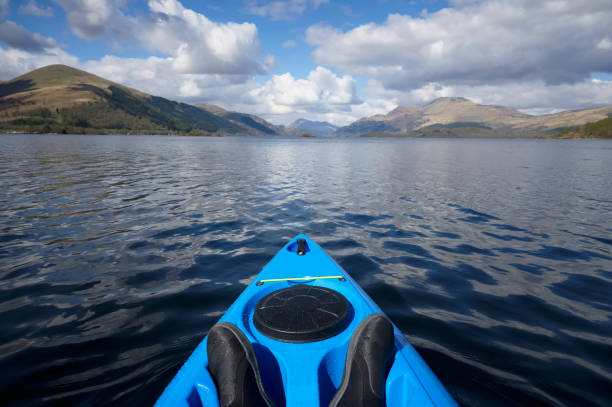 istock Blue kayak on open water at Loch Lomond 1393210775