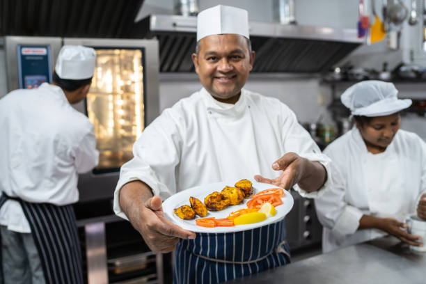 istock Displaying a plate of Indian food 1393223577