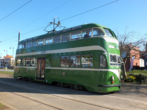Fleetwood, Blackpool, Lancashire, United Kingdom - 5 March 2022: vintage 1930s english electric blackpool tram on the road in fleetwood town centre
